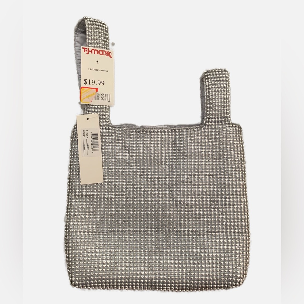 Silver purse by Prezzo.  NWTS.  Snap closure.  10” x 9”.